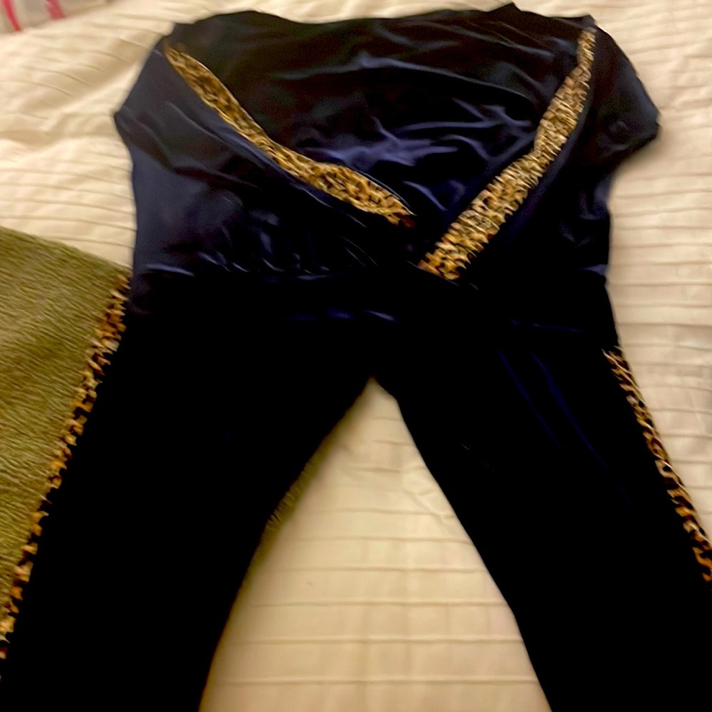 Velour 2 piece navy blue with leopard strips on each sides. Shirt off shoulder